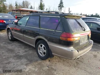 1999 Subaru Legacy Wagon Outback with VIN 4S3BG6856X7603852, listed as a IAAI auction lot 41299373 with 168,991 mi miles. Bid and sale history available at carsss.com. Image 3.
