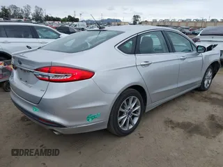 2017 Ford Fusion Energi SE with VIN 3FA6P0PU9HR354096, listed as a IAAI auction lot 42064703 with 69,601 mi miles. Bid and sale history available at carsss.com. Image 4.