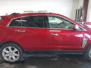 2016 Cadillac SRX Performance Collection with VIN 3GYFNCE37GS573250, listed as a IAAI auction lot 42443435 with 63,368 mi miles and . Bid and sale history available at DreamBid. Image 14.