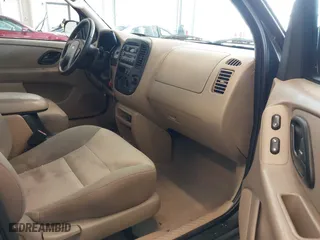 2003 Ford Escape XLS Popular with VIN 1FMYU02143KC35891, listed as a IAAI auction lot 41599760 with 148,381 mi miles. Bid and sale history available at carsss.com. Image 5.