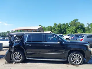 2015 GMC Yukon XL Denali with VIN 1GKS2JKJ9FR244754, listed as a IAAI auction lot 39706952 with 94,917 mi miles. Bid and sale history available at carsss.com. Image 14.
