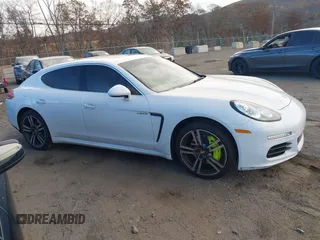 2014 Porsche Panamera S E-Hybrid with VIN WP0AD2A76EL044722, listed as a IAAI auction lot 40716615 with 52,474 mi miles and . Bid and sale history available at DreamBid. Image 13.