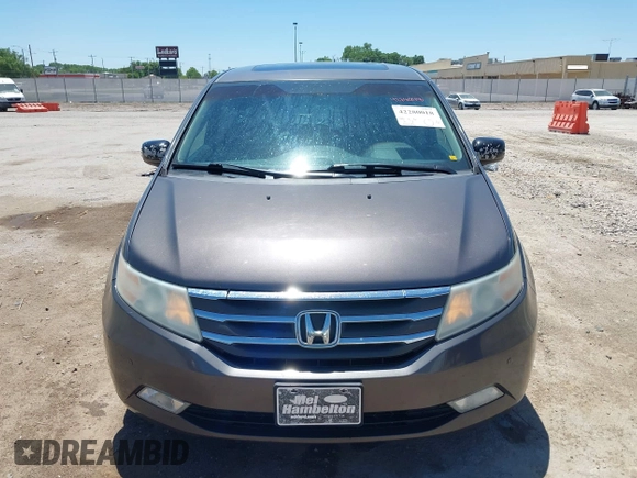 2012 Honda Odyssey Touring with VIN 5FNRL5H93CB109394, listed as a IAAI auction lot 42280018 with 190,412 mi miles and . Bid and sale history available at DreamBid. Image 12.