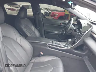 2022 Toyota Avalon XLE z VIN 4T1JZ1FB2NU073049, wystawiony jako IAAI lot #41506550 z przebiegiem 52 073 mil mil oraz . Historia ofert i sprzedaży dostępna na DreamBid. Obrazek 5.