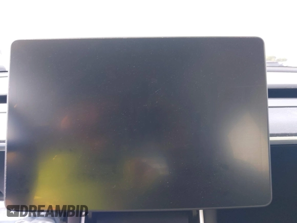 2021 Tesla Model Y Standard Range with VIN 5YJYGDED4MF112857, listed as a IAAI auction lot 41134600 with Not Provided miles and . Bid and sale history available at DreamBid. Image 16.