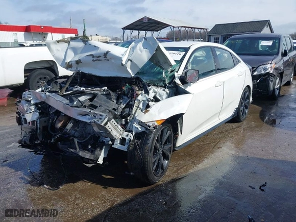 2018 Honda Civic Hatchback Sport with VIN SHHFK7H46JU403910, listed as a IAAI auction lot 41570110 with 112,221 mi miles. Bid and sale history available at carsss.com. Image 2.