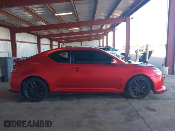 2016 Scion tC z VIN JTKJF5C77GJ023409, wystawiony jako IAAI lot #41538972 z przebiegiem 121 283 mil mil oraz . Historia ofert i sprzedaży dostępna na DreamBid. Obrazek 13.