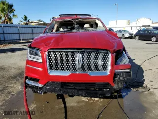 2020 Lincoln Navigator Reserve with VIN 5LMJJ2LT3LEL11859, listed as a Copart auction lot 67863284 with 16,490 mi miles and Salvage Title. Bid and sale history available at carsss.com. Image 5.