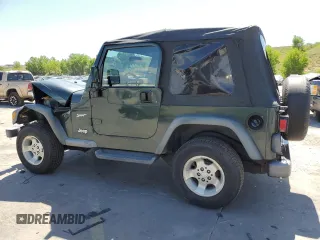 2002 Jeep Wrangler Sport с VIN 1J4FA49SX2P738105, выставлен на аукционе Copart как лот 60320775 с пробегом 402 518 миль миль и Списание • Salvage title. История ставок и продаж доступна на DreamBid. Изображение 2.