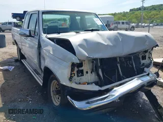 1996 Ford F-150 with VIN 1FTEX14N7TKA11552, listed as a IAAI auction lot 42083933 with 203,300 mi miles and . Bid and sale history available at DreamBid. Image 1.