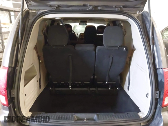 2015 Dodge Grand Caravan SE with VIN 2C4RDGBG2FR643477, listed as a IAAI auction lot 41955909 with 451,432 mi miles and . Bid and sale history available at DreamBid. Image 17.