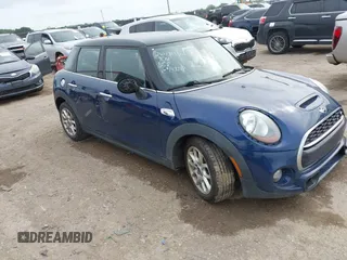 2017 MINI Hardtop 4 Door Cooper S z VIN WMWXU3C3XH2F49313, wystawiony jako IAAI lot #42137594 z przebiegiem 87 865 mil mil oraz . Historia ofert i sprzedaży dostępna na DreamBid. Obrazek 1.