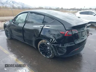 2023 Tesla Model Y Long Range with VIN 7SAYGDEE5PF766685, listed as a IAAI auction lot 41933729 with 25,959 mi miles and . Bid and sale history available at DreamBid. Image 3.