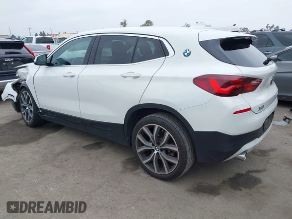 2022 BMW X2 sDrive28i z VIN WBXYH9C06N5U37719, wystawiony jako IAAI lot #42355050 z przebiegiem 33 127 mil mil oraz . Historia ofert i sprzedaży dostępna na DreamBid. Obrazek 3.