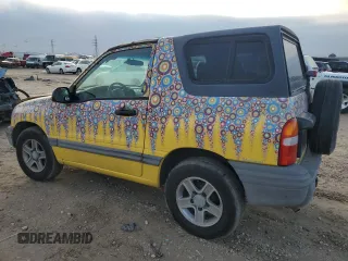 2003 Chevrolet Tracker z VIN 2CNBE18C136928311, wystawiony jako Copart lot #84463154 z przebiegiem 118 195 mil mil oraz Szkoda całkowita • Salvage title. Historia ofert i sprzedaży dostępna na DreamBid. Obrazek 2.