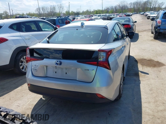 2021 Toyota Prius LE z VIN JTDL9MFU3M3028805, wystawiony jako IAAI lot #42043610 z przebiegiem 26 436 mil mil oraz . Historia ofert i sprzedaży dostępna na DreamBid. Obrazek 16.