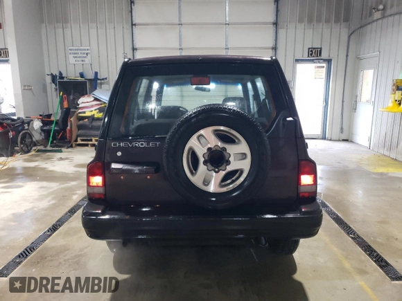 1998 Chevrolet Tracker z VIN 2CNBJ1362W6919635, wystawiony jako Copart lot #56894355 z przebiegiem 140 298 mil mil oraz Szkoda całkowita • Salvage title. Historia ofert i sprzedaży dostępna na DreamBid. Obrazek 6.