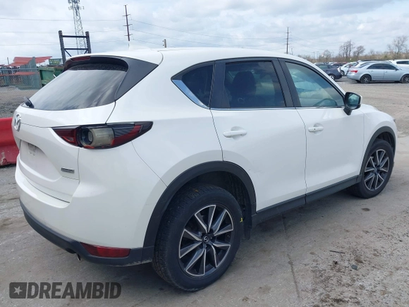 2018 Mazda CX-5 Touring with VIN JM3KFBCMXJ0353369, listed as a IAAI auction lot 41902554 with 154,104 mi miles and . Bid and sale history available at DreamBid. Image 4.
