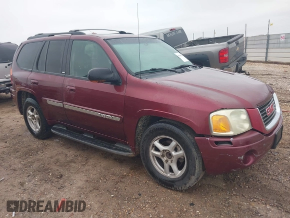 2003 GMC Envoy SLT z VIN 1GKDS13S532314397, wystawiony jako IAAI lot #41184274 z przebiegiem 232 750 mil mil oraz . Historia ofert i sprzedaży dostępna na DreamBid. Obrazek 1.
