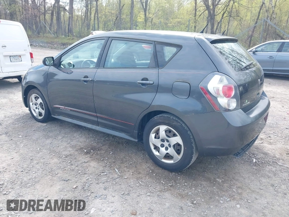 2009 Pontiac Vibe w/1SA with VIN 5Y2SL67859Z404323, listed as a IAAI auction lot 42172647 with 179,874 mi miles. Bid and sale history available at carsss.com. Image 3.