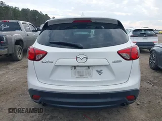2016 Mazda CX-5 Touring with VIN JM3KE2CY5G0791537, listed as a IAAI auction lot 41396276 with 42,095 mi miles. Bid and sale history available at carsss.com. Image 17.