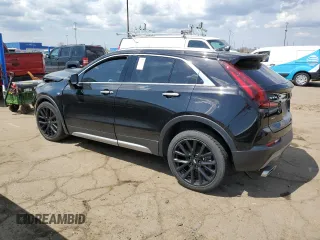 2021 Cadillac XT4 AWD Premium Luxury z VIN 1GYFZDR48MF081095, wystawiony jako Copart lot #54206265 z przebiegiem 60 923 mil mil oraz Tytuł czysty. Historia ofert i sprzedaży dostępna na DreamBid. Obrazek 2.