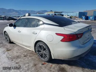2016 Nissan Maxima 3.5 SL with VIN 1N4AA6AP6GC439010, listed as a IAAI auction lot 41448444 with 84,888 mi miles. Bid and sale history available at carsss.com. Image 3.