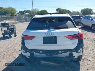 2021 Audi Q3 Premium with VIN WA1AUCF32M1097059, listed as a IAAI auction lot 41825132 with 66,144 mi miles and . Bid and sale history available at DreamBid. Image 16.