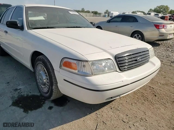 1999 Ford Crown Victoria Police Pkg with VIN 2FAFP71W7XX156457, listed as a Copart auction lot 71623954 with NaN miles and Salvage Title. Bid and sale history available at carsss.com. Image 10.
