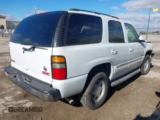 2005 GMC Yukon SLT with VIN 1GKEC13VX5J133090, listed as a IAAI auction lot 41281908 with 108,598 mi miles. Bid and sale history available at carsss.com. Image 4.