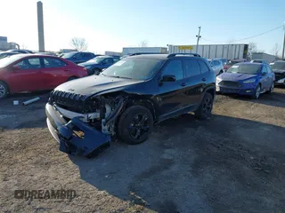 2016 Jeep Cherokee Latitude with VIN 1C4PJMCB1GW153316, listed as a IAAI auction lot 41430871 with 107,684 mi miles and . Bid and sale history available at carsss.com. Image 18.