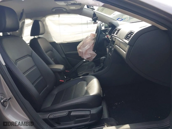 2014 Volkswagen Passat Wolfsburg Ed with VIN 1VWAT7A38EC089882, listed as a IAAI auction lot 41945624 with 130,162 mi miles. Bid and sale history available at carsss.com. Image 5.