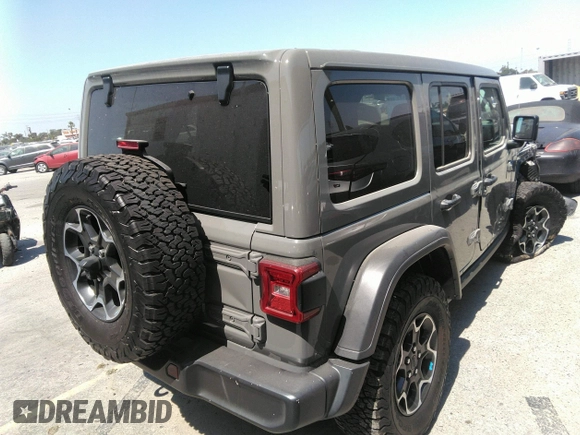 2022 Jeep Wrangler Unlimited Rubicon with VIN 1C4JJXR60NW182756, listed as a IAAI auction lot 36927414 with Not provided miles and . Bid and sale history available at DreamBid. Image 4.