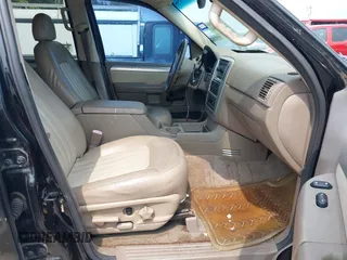 2003 Mercury Mountaineer Convenience z VIN 4M2ZU66W93ZJ43937, wystawiony jako IAAI lot #42303254 z przebiegiem 184 057 mil mil oraz . Historia ofert i sprzedaży dostępna na DreamBid. Obrazek 5.