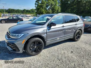 2023 Volkswagen Tiguan SE R-Line Black with VIN 3VVCB7AX3PM056471, listed as a Copart auction lot 60679225 with 94,752 mi miles and Clean title. Bid and sale history available at DreamBid. Image 1.