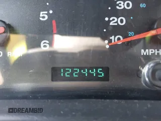 2002 Jeep Wrangler X with VIN 1J4FA39S52P770664, listed as a IAAI auction lot 41661580 with 122,445 mi miles. Bid and sale history available at carsss.com. Image 7.