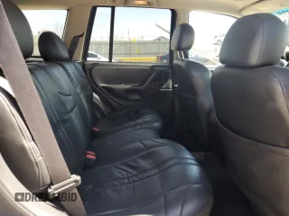 2004 Jeep Grand Cherokee Laredo with VIN 1J4GW48S24C343496, listed as a Copart auction lot 51631915 with 186,216 mi miles and Salvage Title. Bid and sale history available at carsss.com. Image 11.