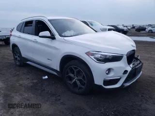 2018 BMW X1 sDrive28i with VIN WBXHU7C35J5H43995, listed as a Copart auction lot 71650602 with 80,437 mi miles. Bid and sale history available at carsss.com. Image 4.