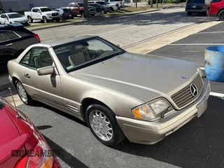 1998 Mercedes-Benz SL-Class with VIN WDBFA67F4WF157541, listed as a Copart auction lot 82624554 with 102,469 mi miles and Clean Title. Bid and sale history available at carsss.com. Image 1.