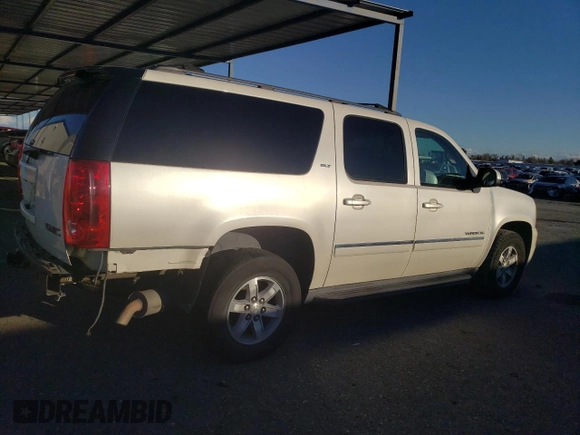 2012 GMC Yukon XL SLT with VIN 1GKS2LE70CR102607, listed as a Copart auction lot 44182865 with 151,301 mi miles and Salvage Title. Bid and sale history available at carsss.com. Image 3.