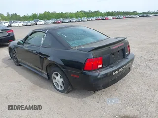 2000 Ford Mustang with VIN 1FAFP4048YF163834, listed as a IAAI auction lot 42090407 with 161,928 mi miles. Bid and sale history available at carsss.com. Image 3.