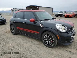 2016 MINI Countryman John Cooper Works with VIN WMWXD1C53GWS95325, listed as a Copart auction lot 77540424 with 98,951 mi miles and Salvage Title. Bid and sale history available at DreamBid. Image 4.