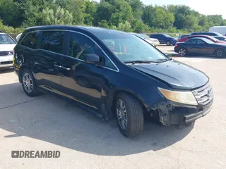 2011 Honda Odyssey EX-L with VIN 5FNRL5H6XBB072400, listed as a IAAI auction lot 42750918 with 219,253 mi miles and . Bid and sale history available at DreamBid. Image 1.