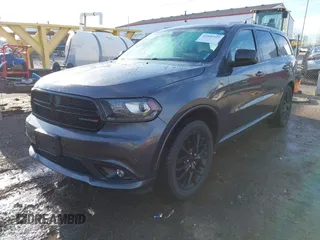 2016 Dodge Durango SXT with VIN 1C4RDHAG3GC502399, listed as a IAAI auction lot 41805525 with 118,836 mi miles and . Bid and sale history available at DreamBid. Image 2.
