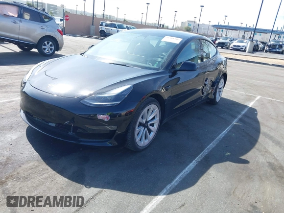 2022 Tesla Model 3 Long Range with VIN 5YJ3E1EB1NF133356, listed as a IAAI auction lot 41568303 with 73,406 mi miles and . Bid and sale history available at DreamBid. Image 18.