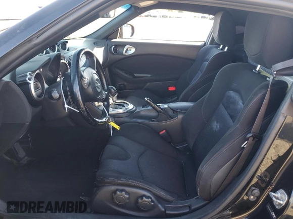 2012 Nissan 370Z Touring with VIN JN1AZ4EH4CM561432, listed as a Copart auction lot 89376935 with 128,955 mi miles and Salvage Title. Bid and sale history available at carsss.com. Image 7.