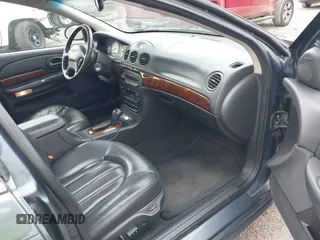 2001 Chrysler LHS z VIN 2C3HC56G01H562025, wystawiony jako IAAI lot #40875197 z przebiegiem 282 882 mil mil oraz . Historia ofert i sprzedaży dostępna na DreamBid. Obrazek 5.