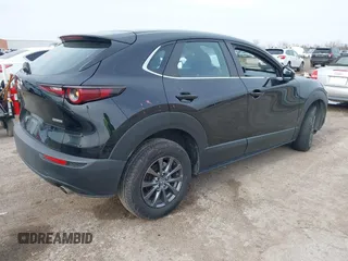 2021 Mazda CX-30 2.5 S with VIN 3MVDMAAL2MM303321, listed as a IAAI auction lot 41583346 with 57,122 mi miles. Bid and sale history available at carsss.com. Image 4.