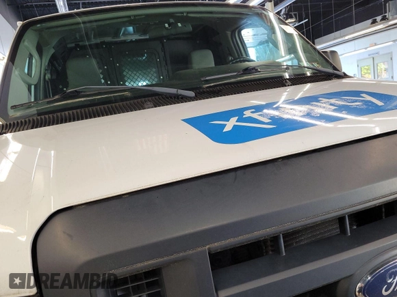 2013 Ford Econoline Cargo Commercial with VIN 1FTNE2EL1DDB26372, listed as a IAAI auction lot 42787142 with 117,378 mi miles and . Bid and sale history available at DreamBid. Image 9.