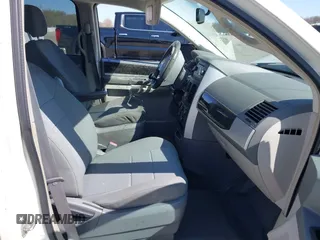 2010 Dodge Grand Caravan SXT with VIN 2D4RN5D14AR420265, listed as a IAAI auction lot 41970366 with 117,208 mi miles and . Bid and sale history available at DreamBid. Image 5.